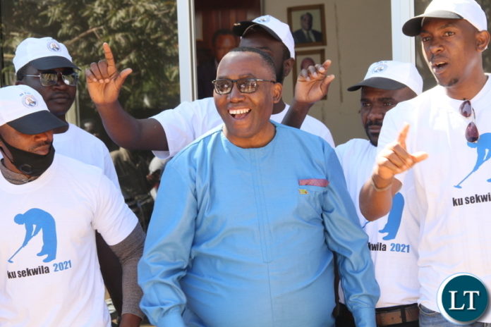 Pictured is New Hope MMD Vice President Rev. Reuben Sambo with New Hope MMD Youths during the launch of the Operation KU SEKWILA 2021 at the MMD Secretariat in Lusaka Yesterday.