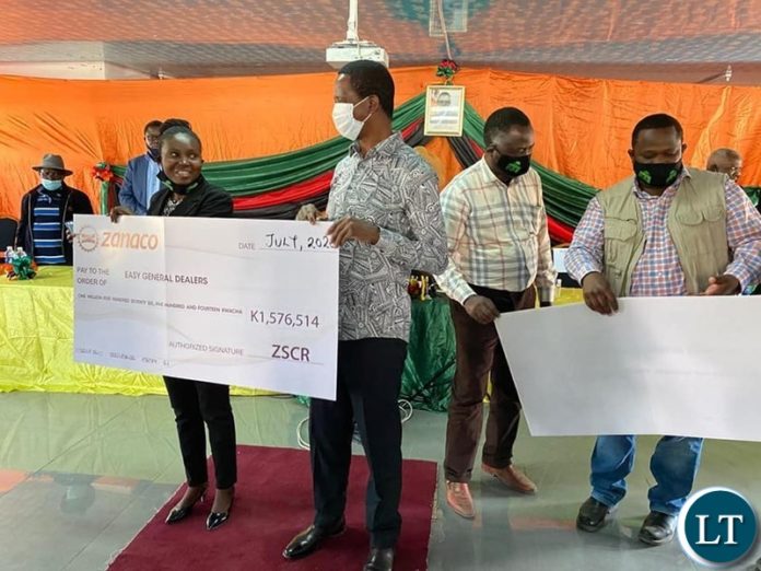 President Lungu handing our Empowerment funds to Beneficiaries of Pilot Program for Climate Resilience