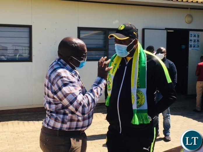 Lusaka Province minister Mr. Bowman Lusambo with Health Minister Dr Chitalu Chilufya at a news briefing