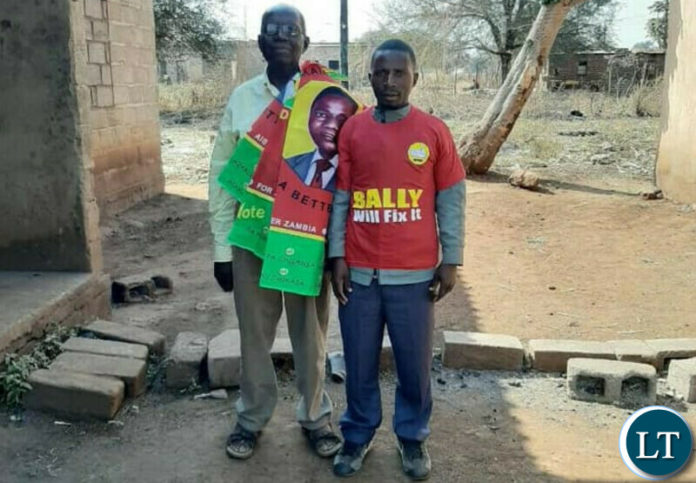Bishop John Mambo pausing for Picture with a UPND cadre