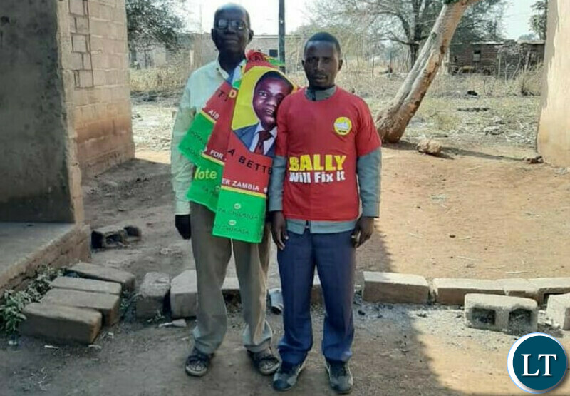 Bishop John Mambo pausing for Picture with a UPND cadre