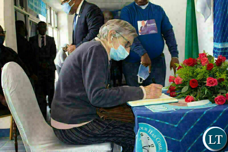 Mrs. Cynia Zukas signs in the MMD 30 year Commemoration book at Democracy House.