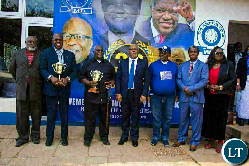  New Hope MMD President Dr. Nevers Mumba ( middle) poses with Vernon Mwaanga Jr (Second from left), Hon. Aka Lewanika ( Third from Left), New Hope MMD Vice President Mr. Reuben Sambo (third from Right) Bishop Mwinga ( Second from Right )