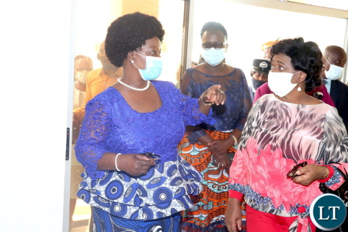 First Lady Esther Lungu speaks with Malawian First Lady Monica Chakwera during a tour of the Esther Lungu Foundation Trust in Njolwe area on Tuesday, September 22,2020