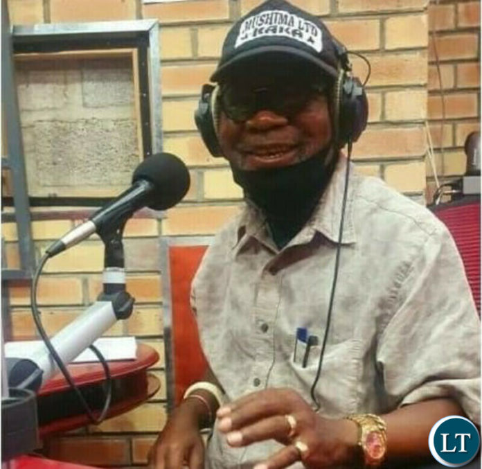 Dr Katele Kalumba in the Hot FM studios