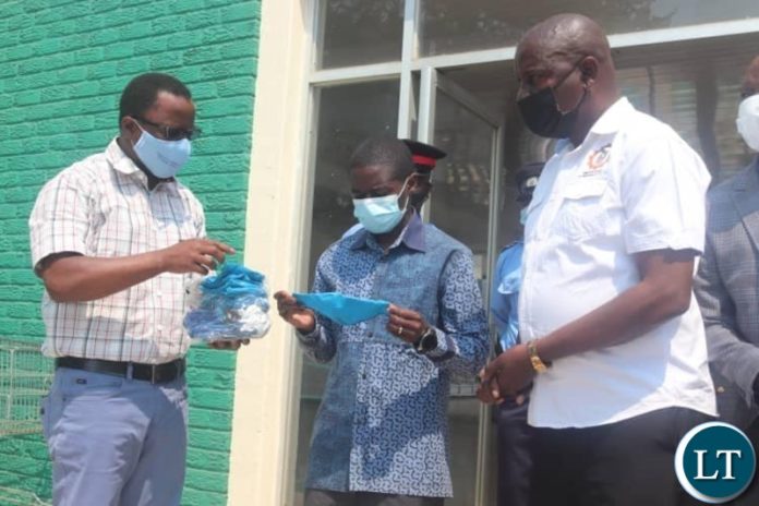 Disaster Management and Mitigation Unit (DMMU) National Coordinator Chanda Kabwe with Luanshya Mayor Nathan Chanda at the Civic Centre.