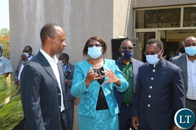 Minister of Works and Supply Slyvia Chalikosa confers with Mulenga Sata (l) and DMMU National Coordinator Chanda Kabwe during the Sata memorial service at Embassy park. Wednesday, October 28, 2020.Picture By ROYD SIBAJENE/ZANIS
