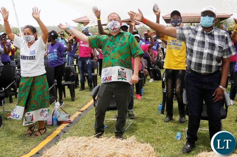 From (right) is Ministry of Health Permanent Secretary for technical services Dr Kennedy Malama and  United States of America Charged- Affairs David Young during the back to school Coronavirus awareness  entertainment programme in Lusaka,s new Kasama.