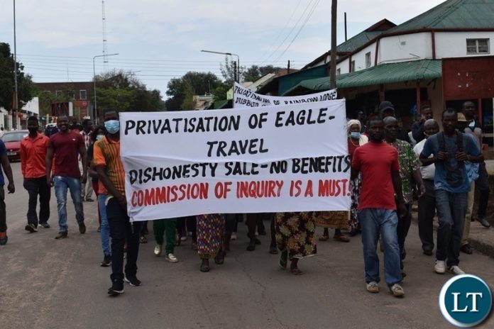 Former Intercontinental Hotel, Zambezi Sawmills, Rainbow Lodge and Eagles Travel employees marching to present petitions to Southern Province Minister Edify Hamukale in solidarity with those calling for a commission of inquiry into the privatisation process. Picture by KELVIN MUDENDA Former Intercontinental Hotel, Zambezi Sawmills, Rainbow Lodge and Eagles Travel employees marching to present petitions to Southern Province Minister Edify Hamukale in solidarity with those calling for a commission of inquiry into the privatisation process. Picture by KELVIN MUDENDA