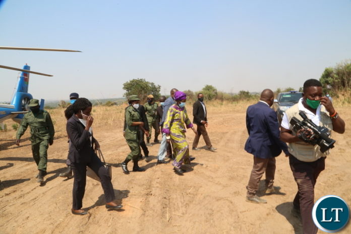 Vice President Inonge Wina lands at the land to be given to flood s and displaced victims in Kitwe