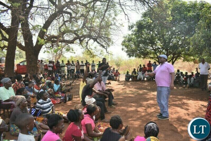 Minister of Nat. Dev. Planning Alexander Chiteme explaining climate change grants under ZIFLP