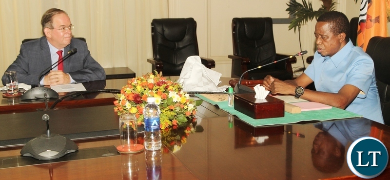 President Edgar Lungu talks to U.S Embassy Charge'd'Affaires, David Young when Mr Young paid a courtesy call on the head of State. On the side lines, the U.S Government pledged its commitment to implement a five- year k39 billion ($1.9 billion) development strategy for Zambia at State House. Picture by SUNDAY BWALYA/ZANIS
