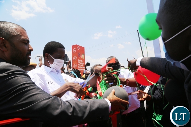 President Edgar Lungu cuts a ribbon to officially commission the newly built Arcades fly-over Bridge in Lusaka. Picture by SUNDAY BWALYA/ZANIS
