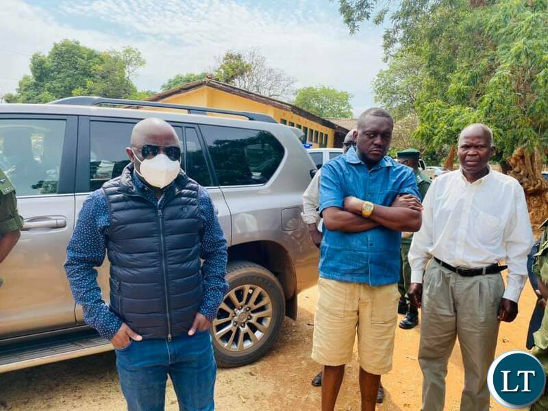 Home Affairs Minister Stephen Kampyongo and Mazabuka Central Member of Parliament Garry Nkombo inspecting NRCs issuance