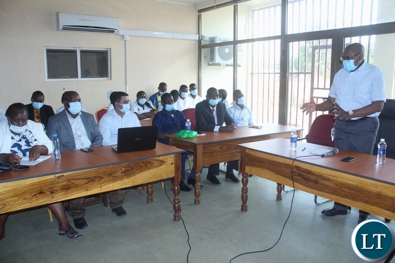 Ministry of Health Technical Services Permanent Secretary Dr. Kennedy Malama (r) addressing health workers at Lewanika General Hospital in Mongu