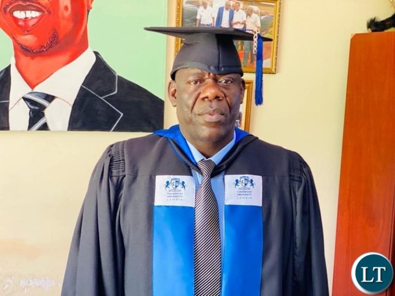 Davies Mwila gets a  Bachelor of Science in Project Management with a Credit