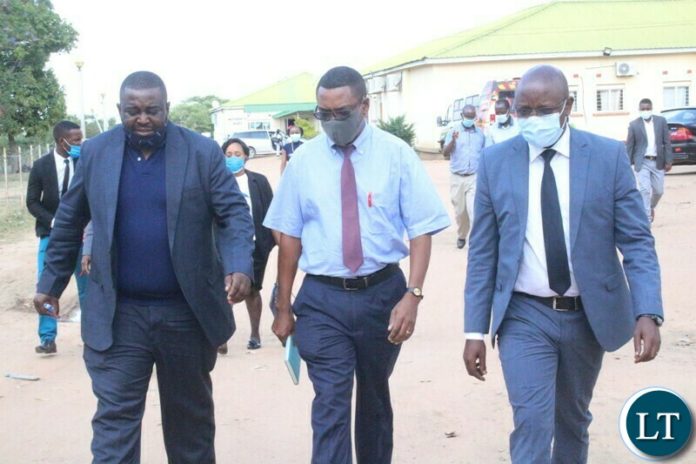 CHOMA Medical Superintendent Dr. George Chipulu (c) leads National Health Insurance Management Authority (NHIMA) Director General James Kapesa (r) and Director Quality Assurance & Accreditation Dr. Mpuma Kamanga (left) in inspecting departments under NHIMA scheme in Choma on Wednesday CHOMA Medical Superintendent Dr. George Chipulu (c) leads National Health Insurance Management Authority (NHIMA) Director General James Kapesa (r) and Director Quality Assurance & Accreditation Dr. Mpuma Kamanga (left) in inspecting departments under NHIMA scheme in Choma on Wednesday