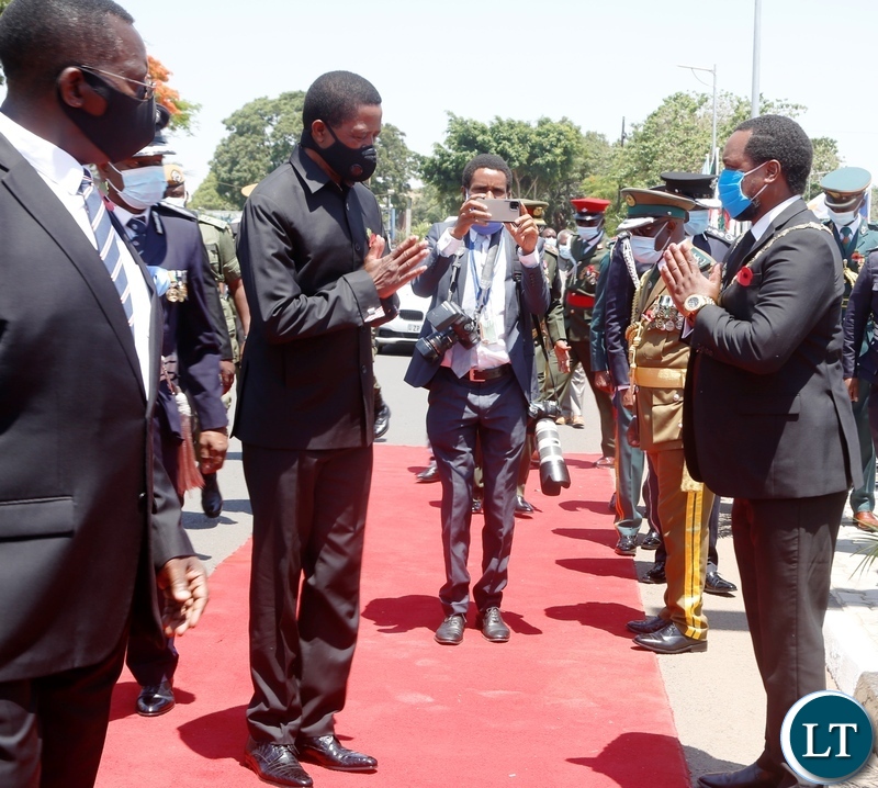 President Edgar Lungu greets Lusaka Mayor Miles Sampa during the remembrance day at the National Cenotaph in Lusaka.Picture by SUNDAY BWALYA/ZANIS
