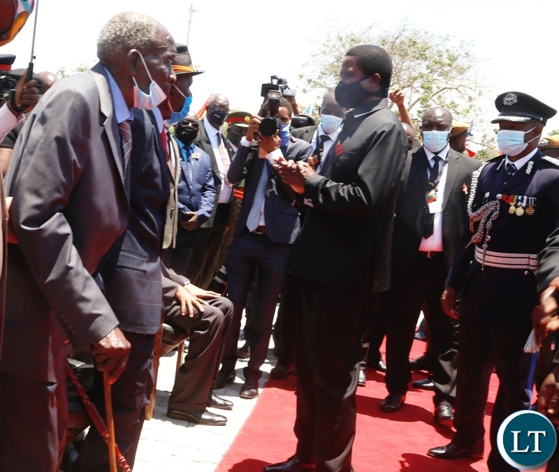 President Edgar Lungu talks to Freedom fighters John Monze 98 (left) and Jackson Bwalya aged 103 years during the remembrance day at the national Cenotaph in Lusaka.Picture by SUNDAY BWALYA/ZANIS.