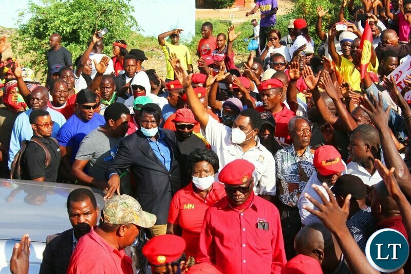 UPND President arrives for the Mobilsation Rally , with William Banda next to him 