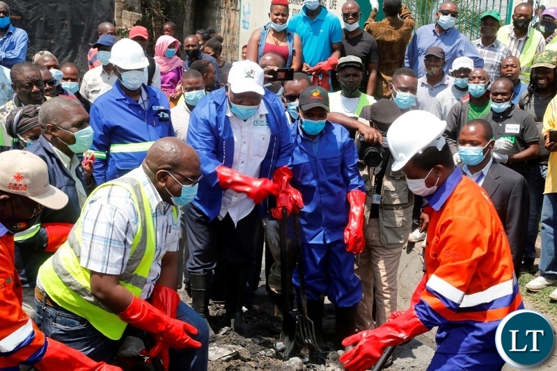 President Edgar Lungu at the drainage clean up exercise in Mandevu Lusaka.