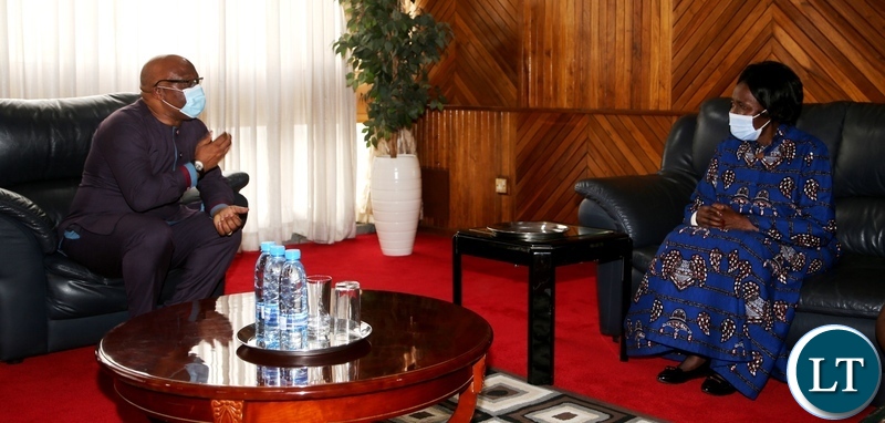 Vice President Inonge Wina confers with former Vice President Nevers Mumba during the commemoration of the declaration of Zambia as a Christian Nation at mulungushi international conference centre yesterday. Tuesday, December 29, 2020. Picture by ROYD SIBAJENE/ZANIS