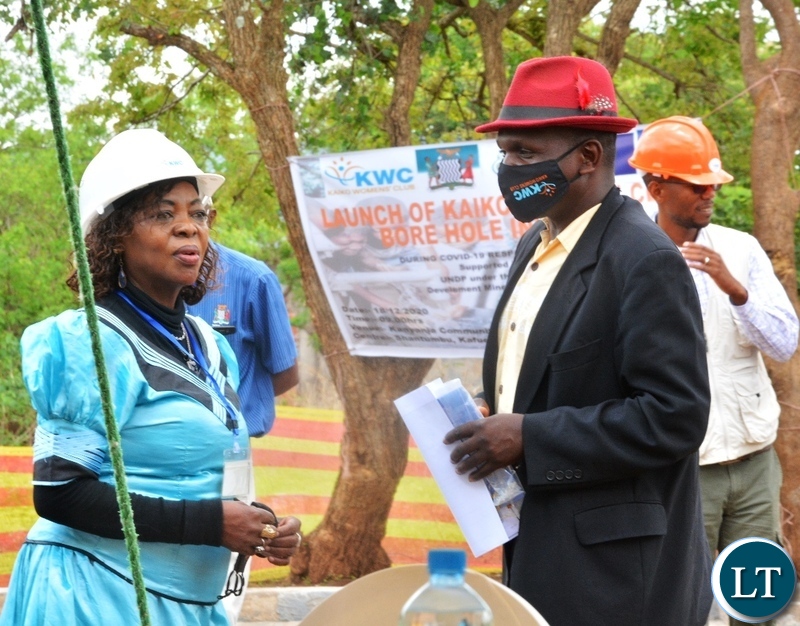 Kaiko Women's Club Chairperson Getrude Mundia talks to Headman Kakote during the launch of Kaiko Women's Club Bore hole initiative in Shantumbu