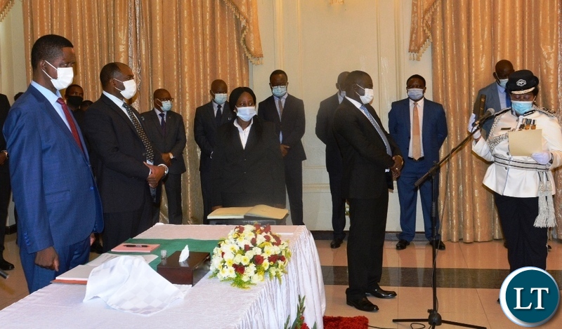 Newly appointed Muchinga Province commissioner of police Lizzy Machina being sworn in during a swearing in Ceremony at State House