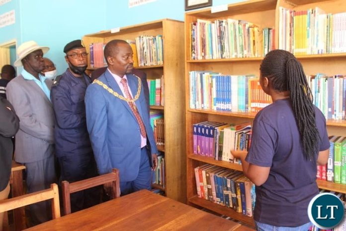 Solwezi Mayor Nicholas Mukumbi inspecting newly opened Library