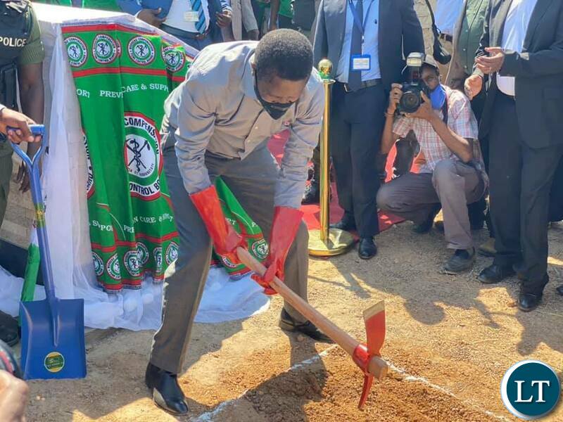 President Edgar Lungu putting a foundation stone on the construction site for an international convention centre, 3 star hotel and shopping mall
