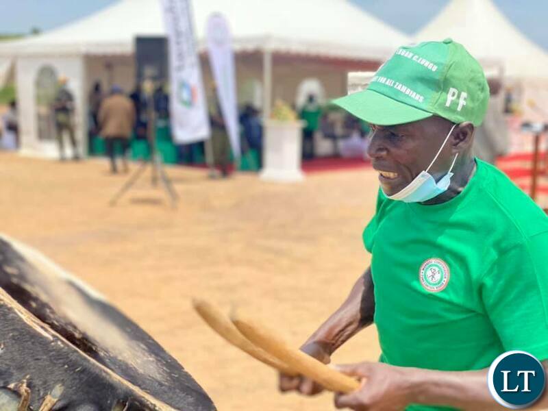 Performers entertain guests during the laying of a foundation stone on the construction site for an international convention centre, 3 star hotel and shopping mall