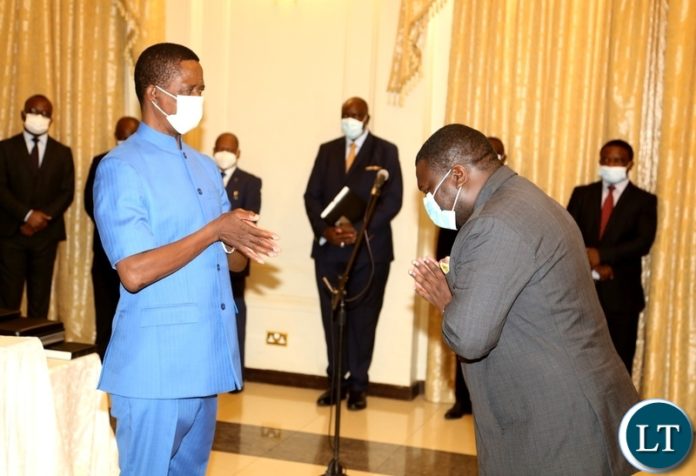 President Edgar Lungu congratulets the newly appointed Minister of Water Development Raphael Nakachinda shortly after swearing in ceremony at State House. Monday, January 11, 2020. Picture by ROYD SIBAJENE/ZANIS