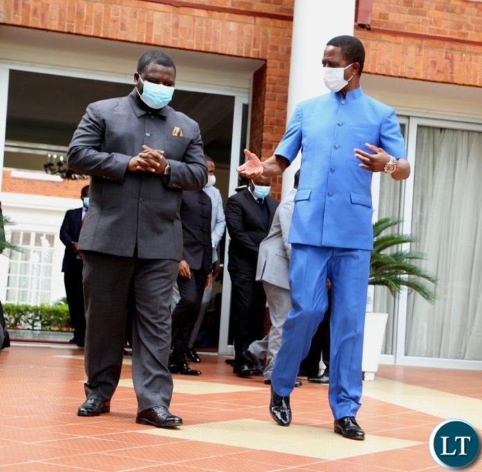 President Edgar Lungu confers with the newly appointed Minister of Water Development Raphael Nakachinda shortly after swearing in ceremony at State House. Monday, January 11, 2020. Picture by ROYD SIBAJENE/ZANIS