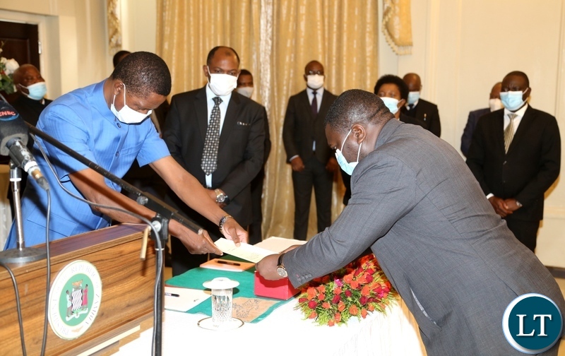 President Edgar Lungu receive the latter of Oath from the newly appointed Minister of Water Development Raphael Nakachinda during swearing in ceremony at State House. Monday, January 11, 2020. Picture by ROYD SIBAJENE/ZANIS