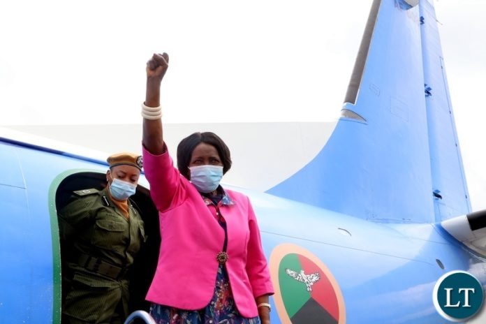 Vice President Inonge Wina wave the party symbol on her arrival at Mongu airport yesterday. Saturday, January 02, 2021. Picture by ROYD SIBAJENE/ZANIS