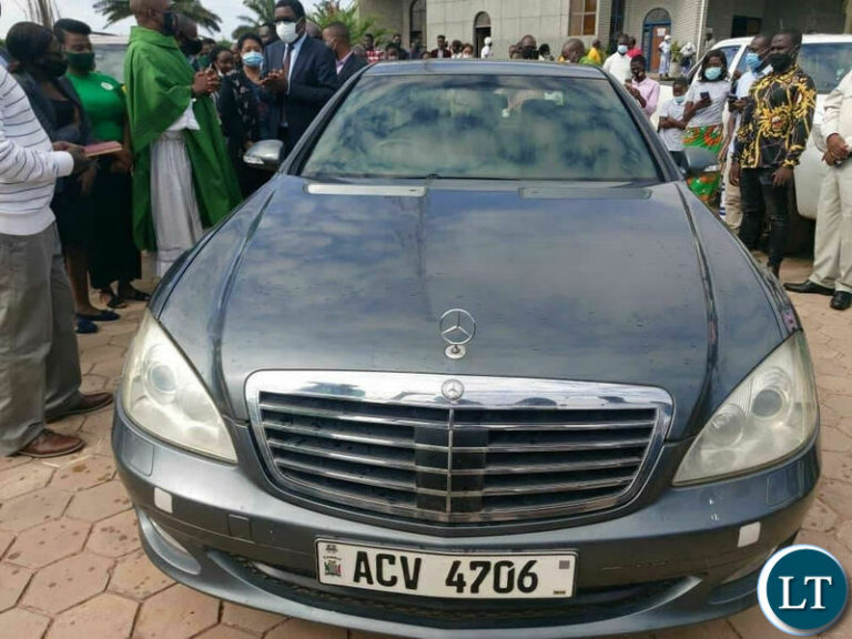 Joe Malanji hands over his Mercedez Benz car to Kitwe Catholic Priest