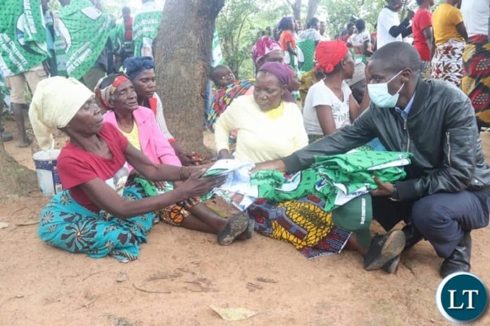 Copperbelt Chairman Nathan Chanda distributing PF regalia at a campain meeting