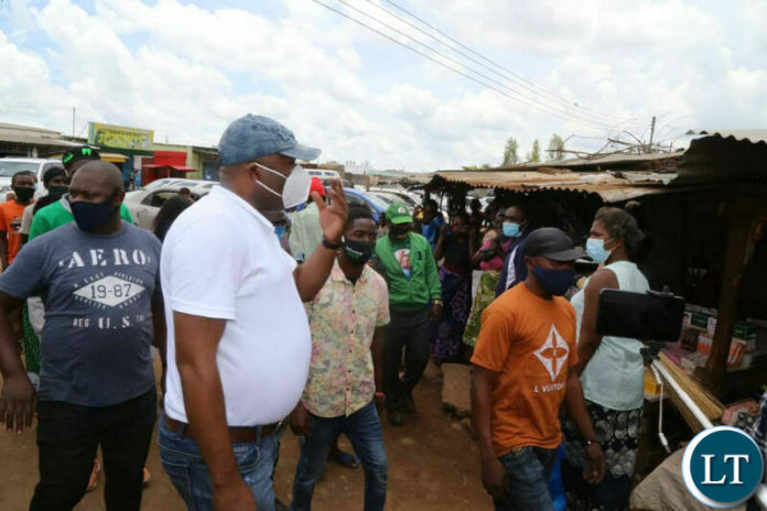 Kabushi Member of Parliament Bowman Lusambo visiting marketeers