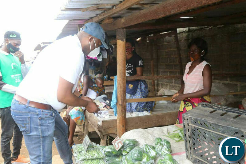 Kabushi Member of Parliament Bowman Lusambo visiting marketeers
