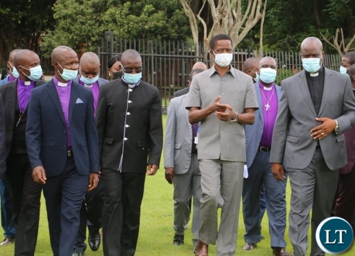 President Edgar Lungu leads the clergymen from Reformed Church in Zambia drawn across the country when they toured fish ponds at State House in Lusaka.