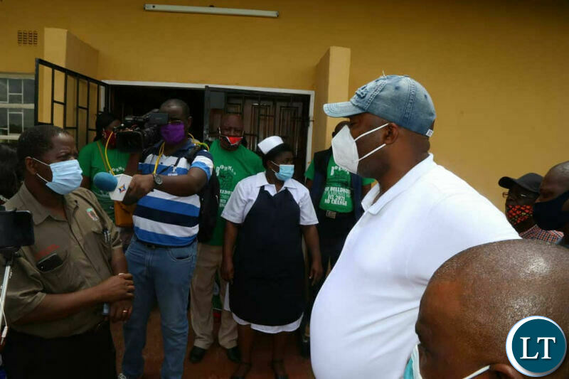 Kabushi Member of Parliament Bowman Lusambo interacting with staff whilst inspecting the unfinished Maternity Annex at Kabushi Clinic 