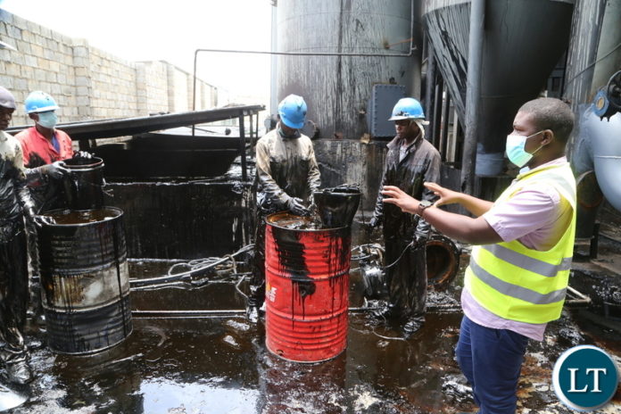 Ministry of Labour Senior Labour Officer Hlupe Luchembe taking notes from workers at Anshan Investment Zambia Limited durning the inspection of the how the company is keeping the workers if it according to the labour laws of Zambiaa Yesterday, Wednesday January 10, 2021. Picture by ROYD SIBAJENE/ZANIS