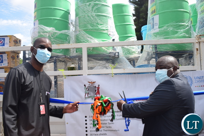 Lusaka Deputy Mayor Christopher Shakafuswa and UNDP Deputy Resident Representative Roland Seri jointly cut the ribbon to kickstart the pilot phase of the Safe Market, Safe Communities project.