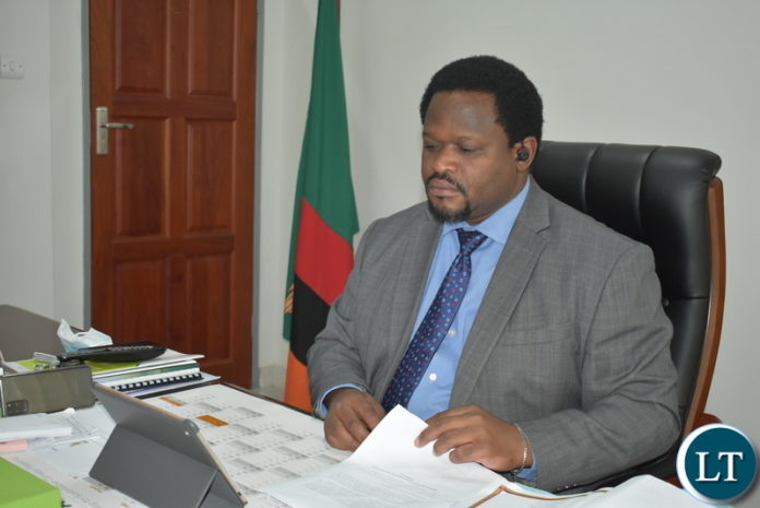 National Dev. Planning Minister Hon. Alexander Chiteme, addressing National Development Coordinating Committee meeting