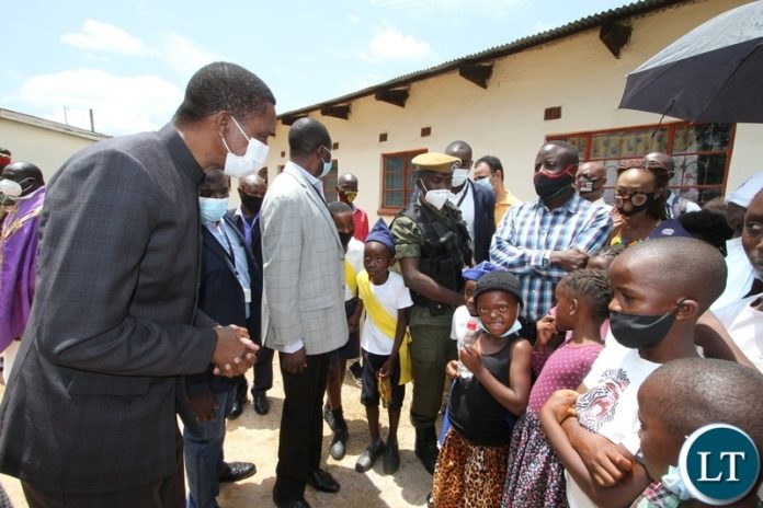 PRESIDENT Edgar Lungu is interact with children at Anglican Diocese of Luapula after attending a church service in Mansa PRESIDENT Edgar Lungu is interact with children at Anglican Diocese of Luapula after attending a church service in Mansa
