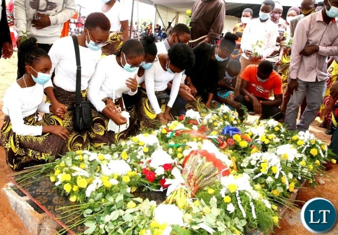 Late Sebastian Zulu's grand children laying wreaths at the grave of their grand father during burial in Petauke's Kakwiya village. Picture by SUNDAY BWALYA/ ZANIS Late Sebastian Zulu's grand children laying wreaths at the grave of their grand father during burial in Petauke's Kakwiya village. Picture by SUNDAY BWALYA/ ZANIS