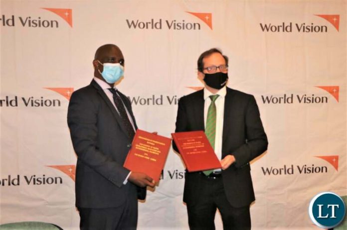Permanent Secretary Mr. Mabvuto Sakala with World Vision Zambia National Director John Hasse