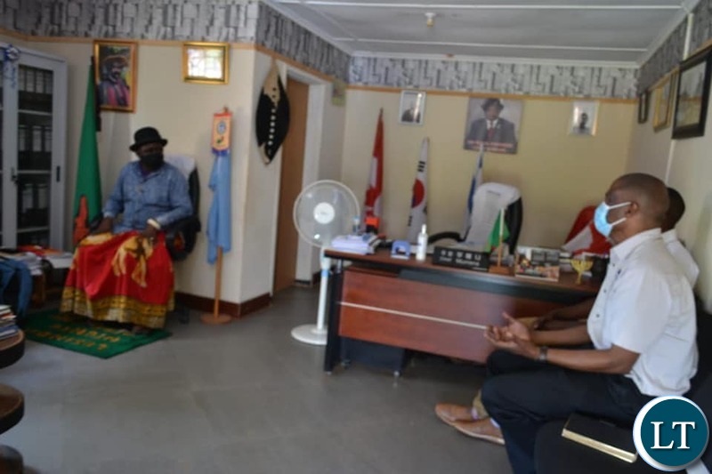 Chief Mumena meeting with  Nyimba Investments Head-Sales and Marketing Manager Willings Mulendema 