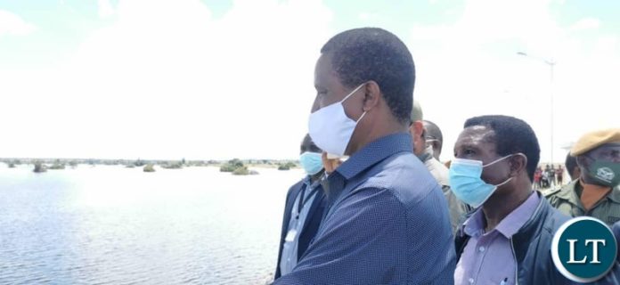 President Edgar Lungu with Agriculture Minister Micheal Katambo touring the the construction of Momboshi Dam in Chisamba District, Central Province.