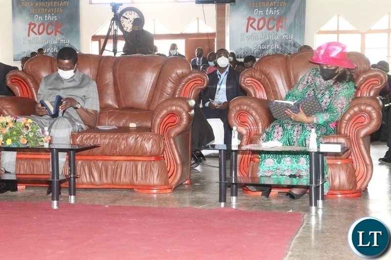 PRESIDENT Edgar Lungu with Minister of National Guidance and Religious Affairs ,Godfridah Sumaili read the bible during the 20th anniversary celebration of Bible Gospel Church in Africa(BIGOCA)in Lusaka.